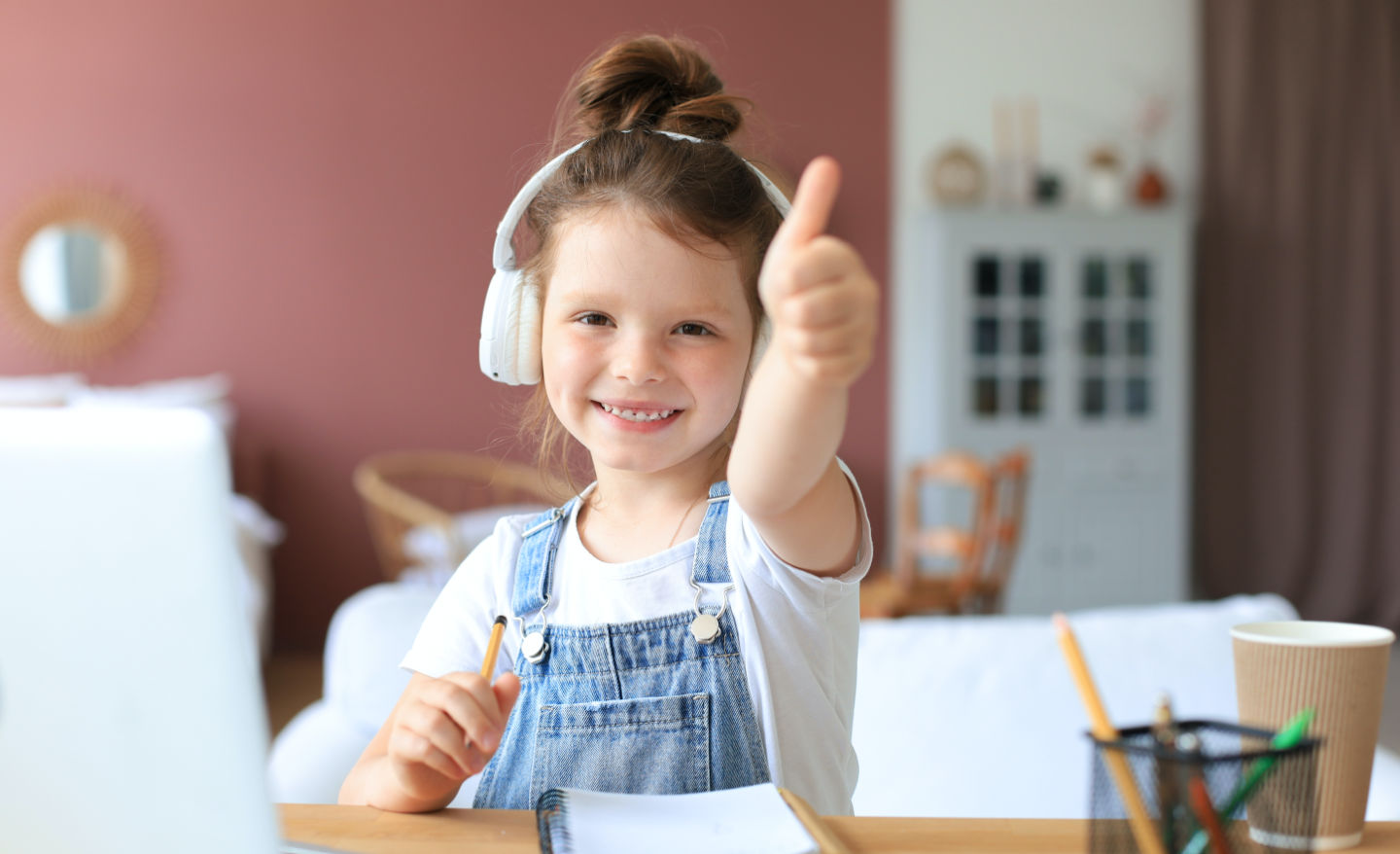 Girl with her thumb up